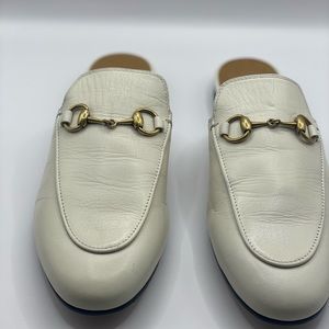 White Gucci loafers slightly worn